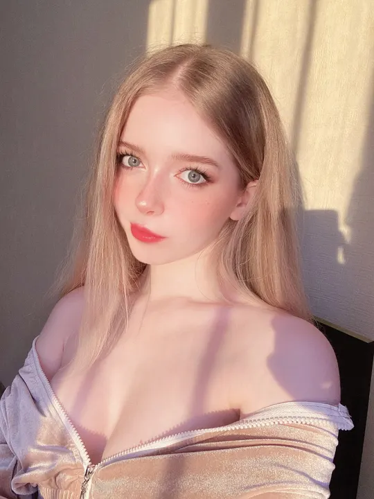 Beige off-shoulder top in sunlight