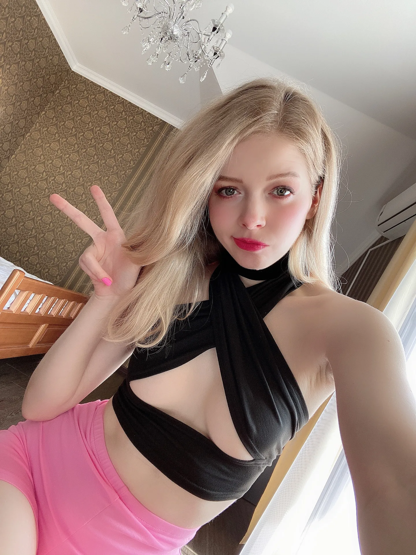 Black wrap top and pink skirt