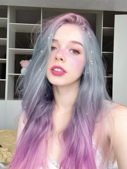Lavender hair and white top