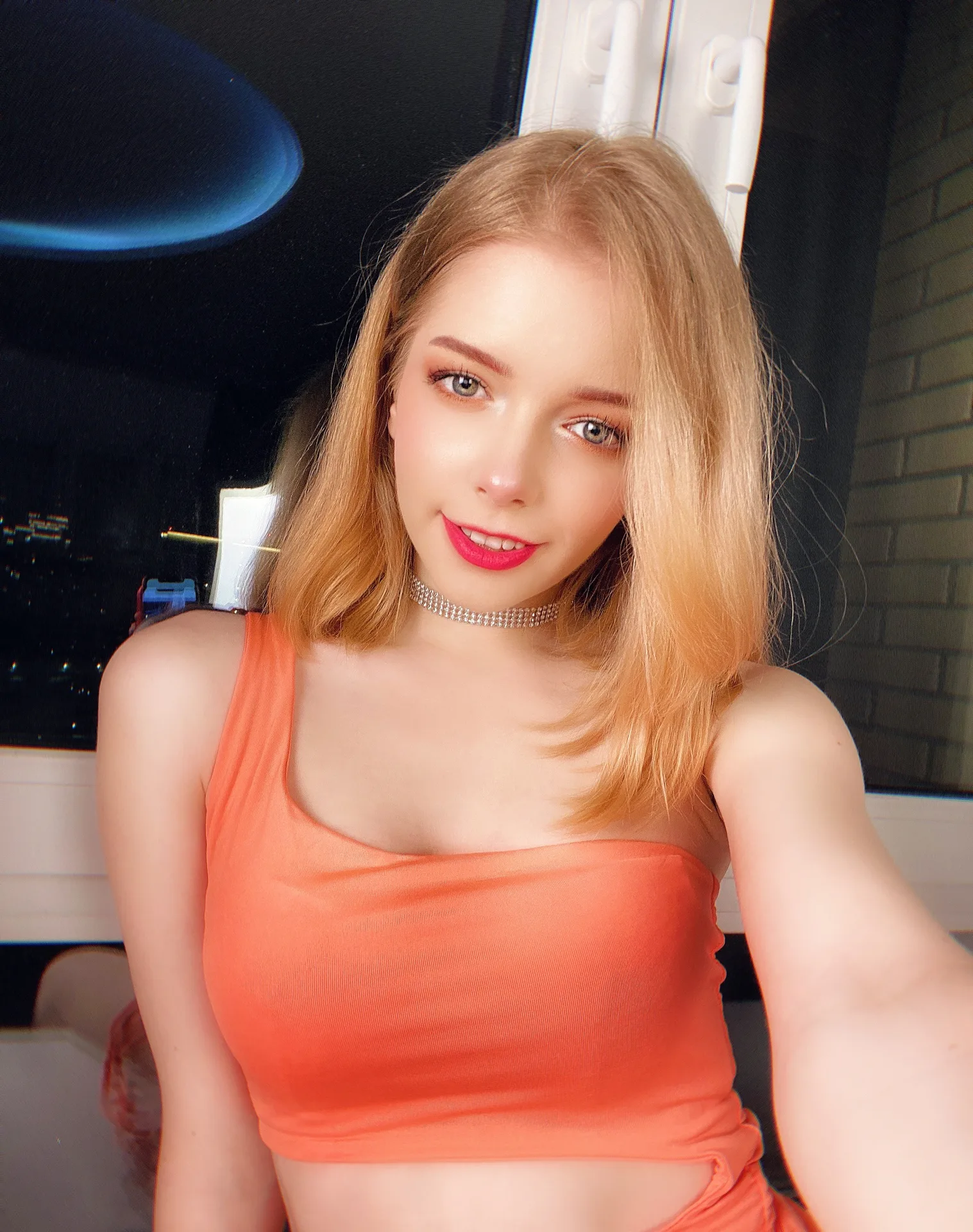 Orange crop top selfie