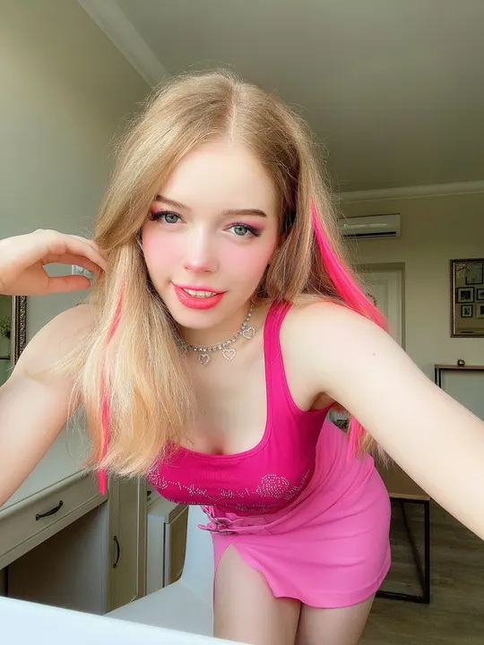 Pink dress in a kitchen