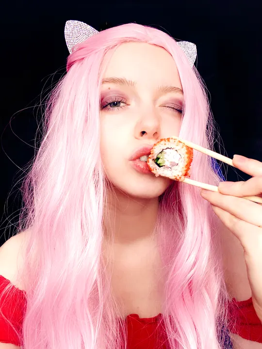 Pink hair and a red top