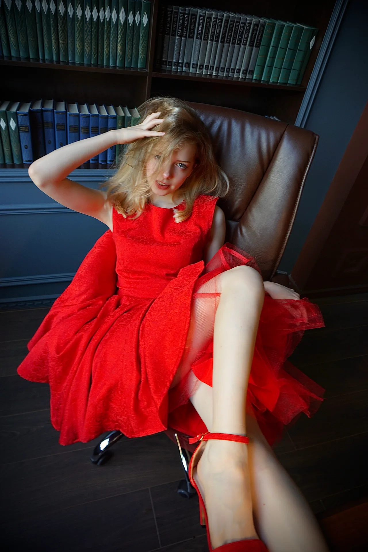 Red dress in an office chair