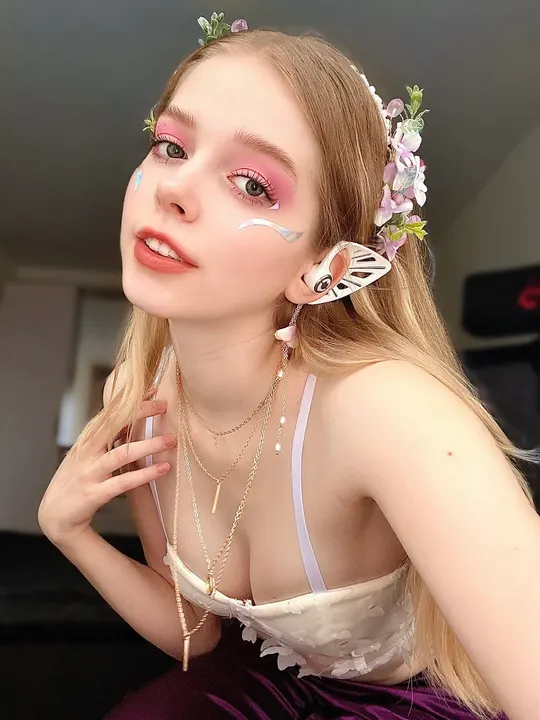 White top and purple skirt
